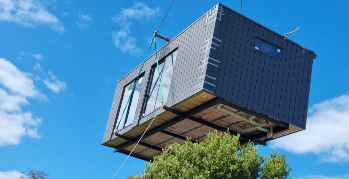 A sleek modern modular home with large windows in Turkey, showcasing contemporary architecture.